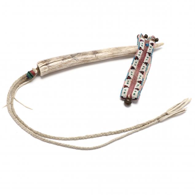 native-american-quirt-with-beaded-strap
