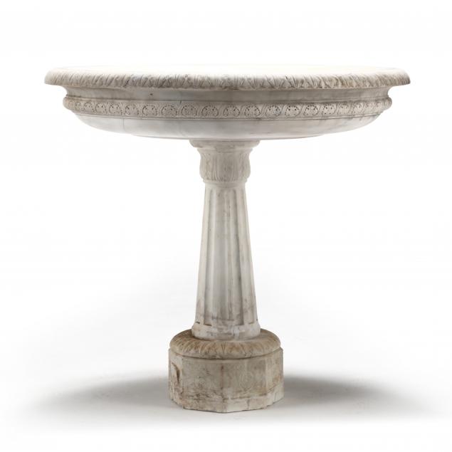 antique-carved-marble-basin-on-pedestal