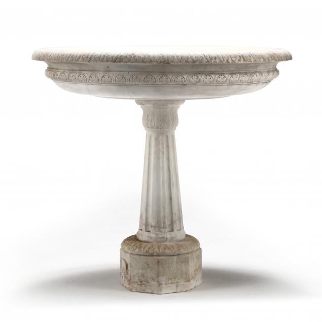 antique-carved-marble-basin-on-pedestal