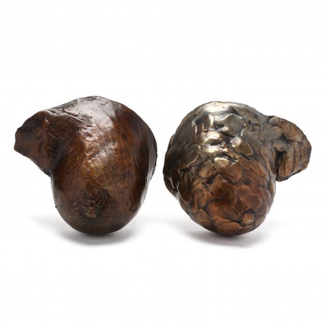 two-patinated-cast-bronze-female-breasts