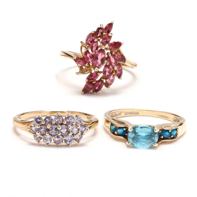 three-gold-and-gem-set-rings