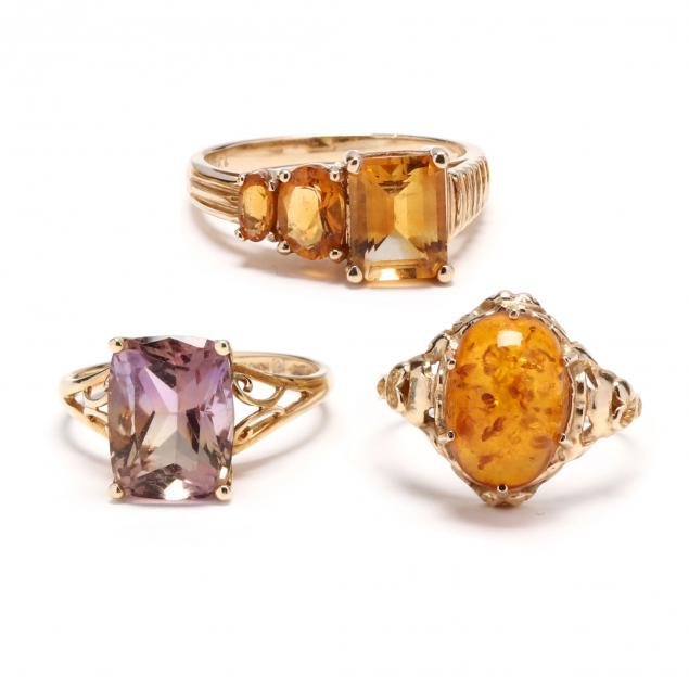 three-gold-and-gem-set-rings