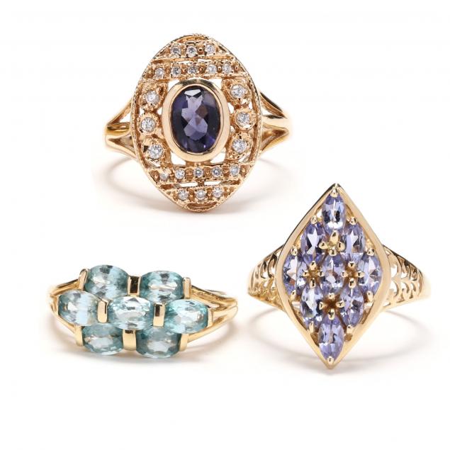 three-gold-and-gem-set-rings