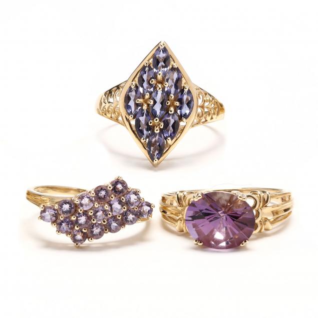 three-gold-and-gem-set-rings