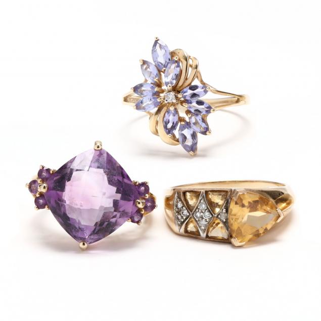 three-gold-and-gem-set-rings