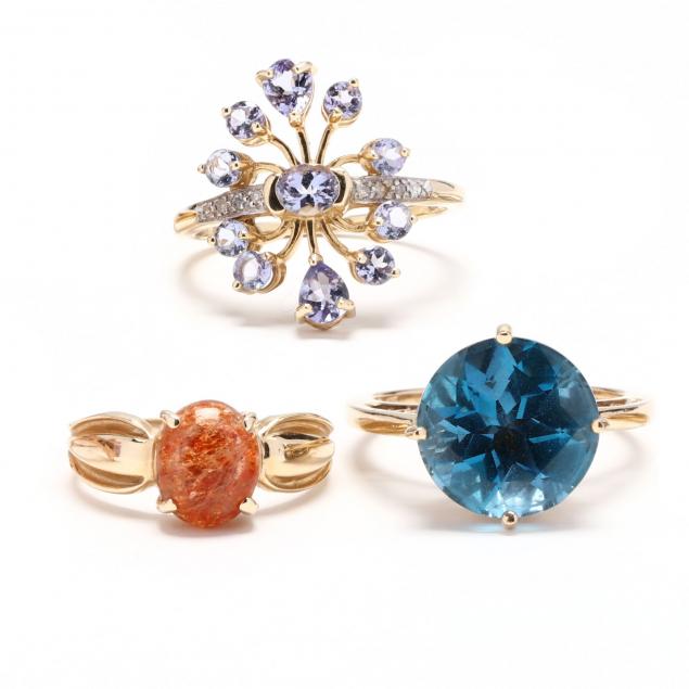 three-gold-and-gem-set-rings