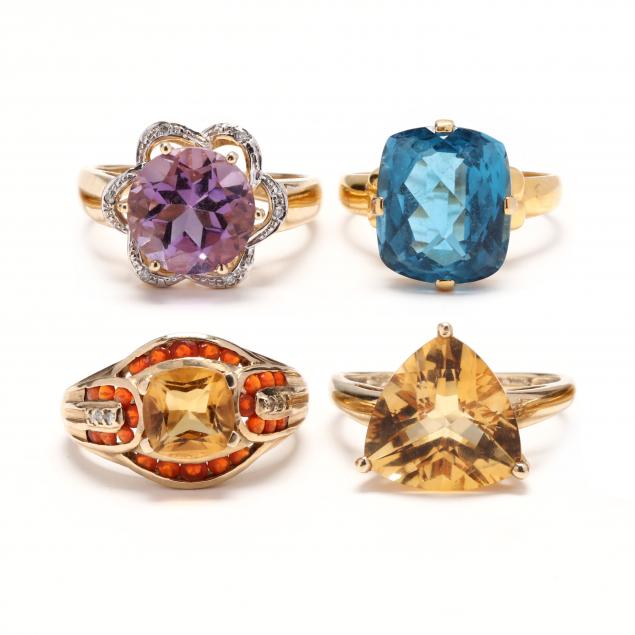 four-gold-and-gem-set-rings