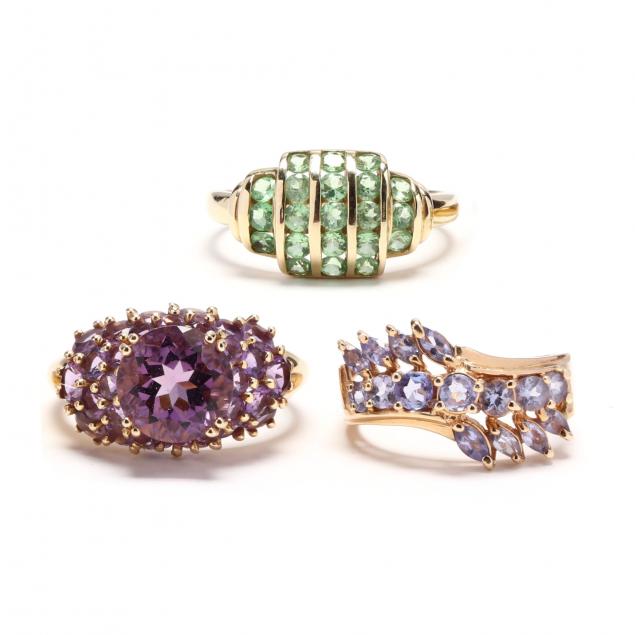 three-gold-and-gem-set-rings