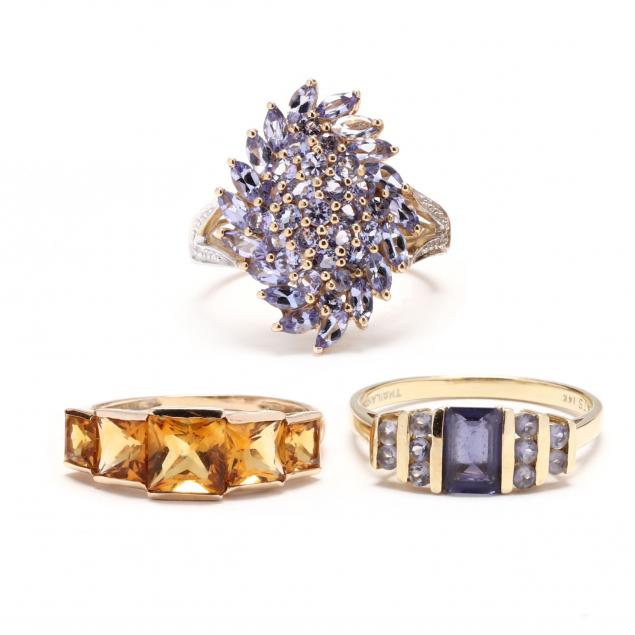 three-gold-and-gem-set-rings