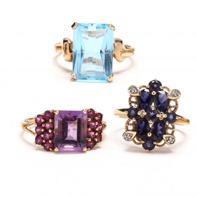 three-gold-and-gem-set-rings