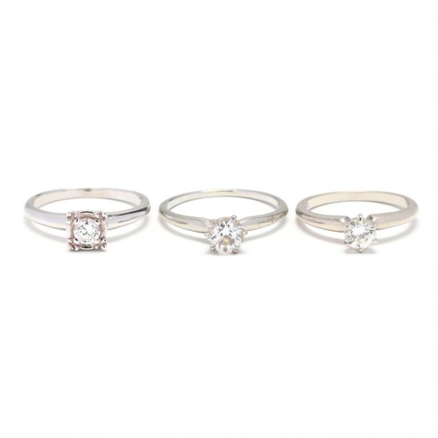 three-white-gold-and-diamond-solitaire-rings