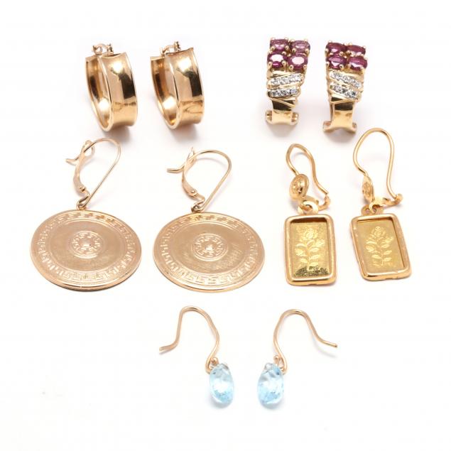 five-pairs-of-yellow-gold-earrings