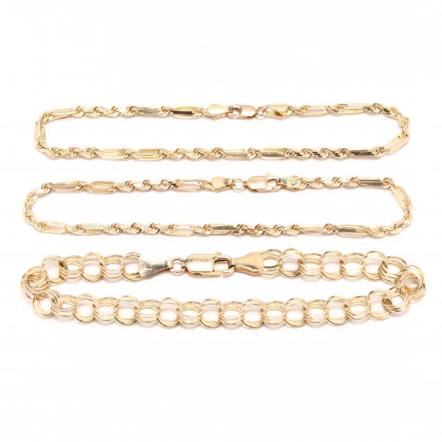 three-yellow-gold-bracelets