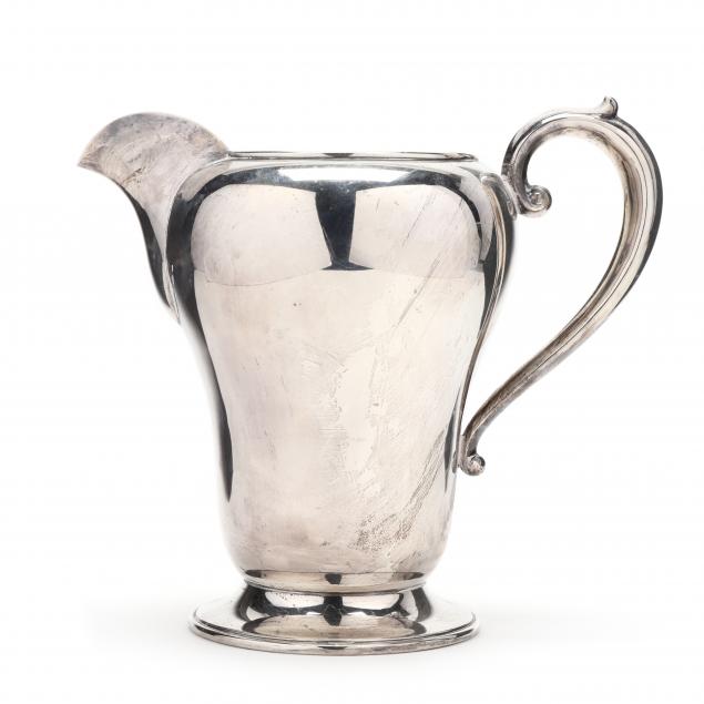 a-sterling-silver-footed-water-pitcher-by-manchester-silver-co