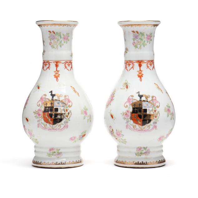 a-pair-of-porcelain-armorial-vases