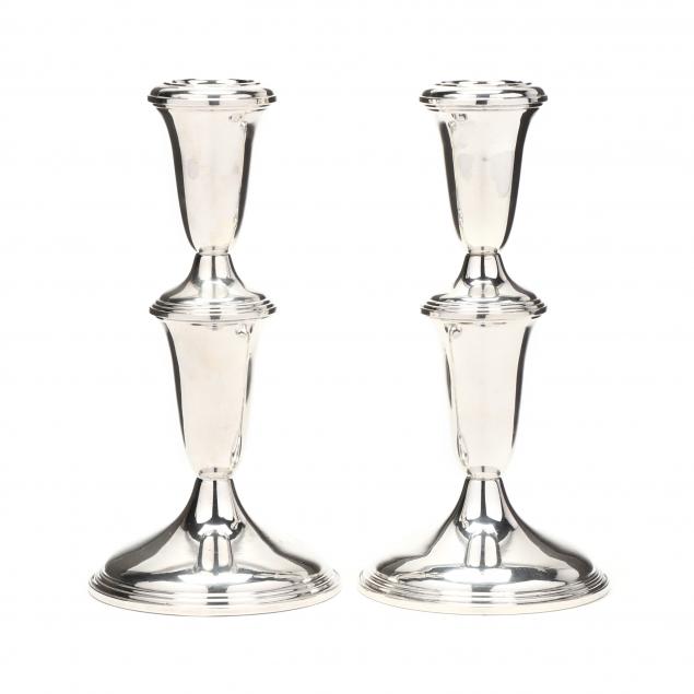 a-pair-of-sterling-silver-candlesticks-by-reed-barton