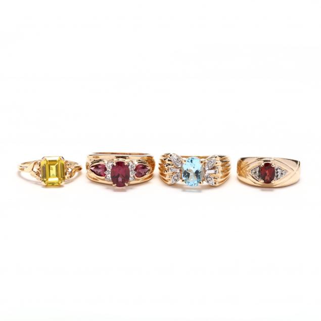 four-gold-and-gem-set-rings