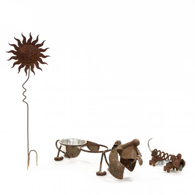 three-small-iron-garden-figures