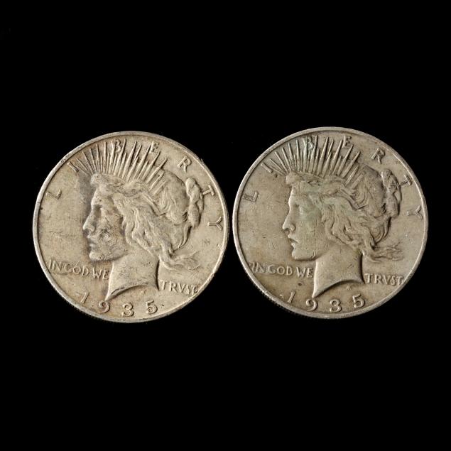 two-circulated-1935-s-peace-silver-dollars