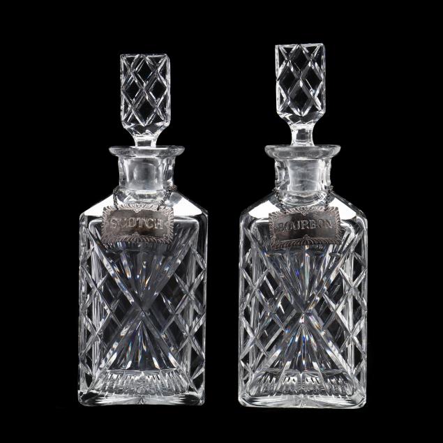 colonial-williamsburg-a-pair-of-cut-crystal-decanters-with-sterling-silver-labels