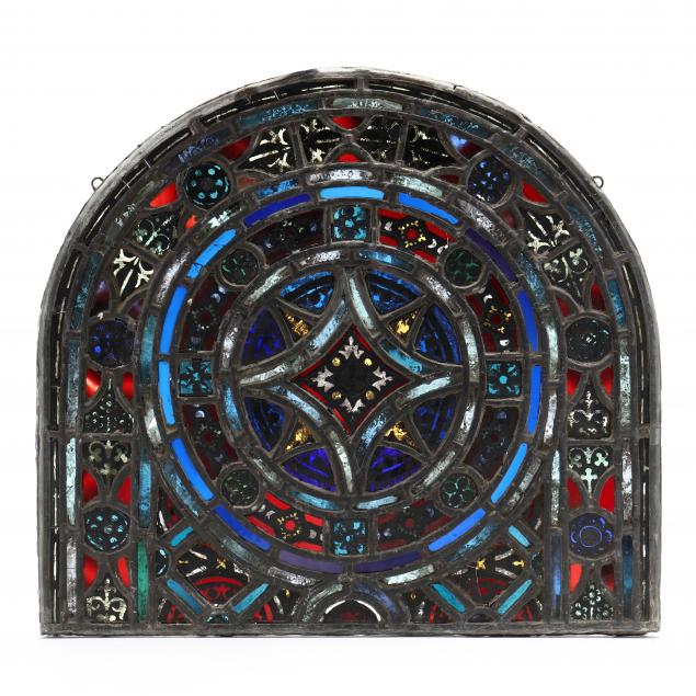 a-small-antique-stained-glass-arched-window