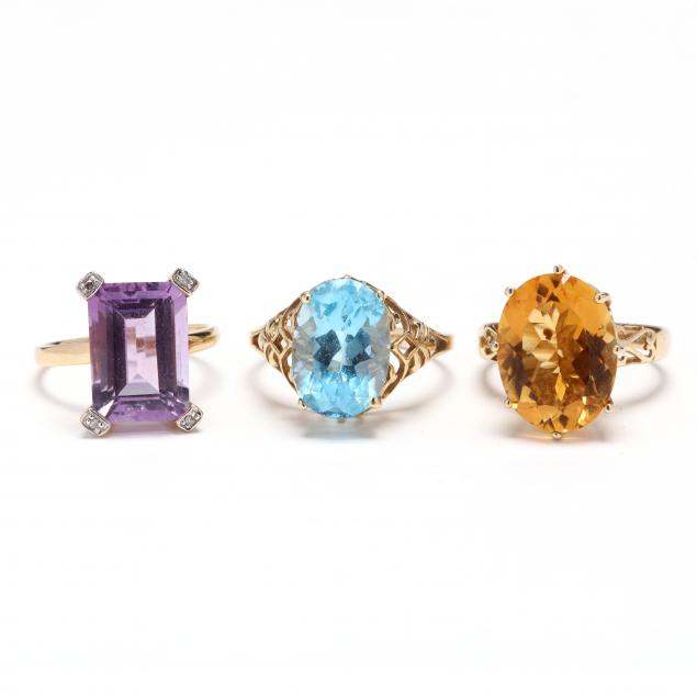 three-gold-and-gem-set-rings