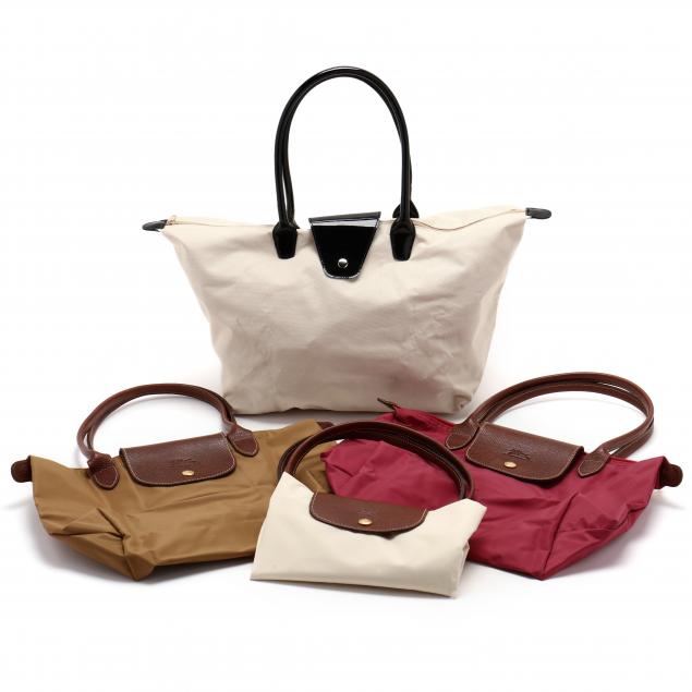 a-group-of-four-i-les-pliages-i-travel-bags-longchamp