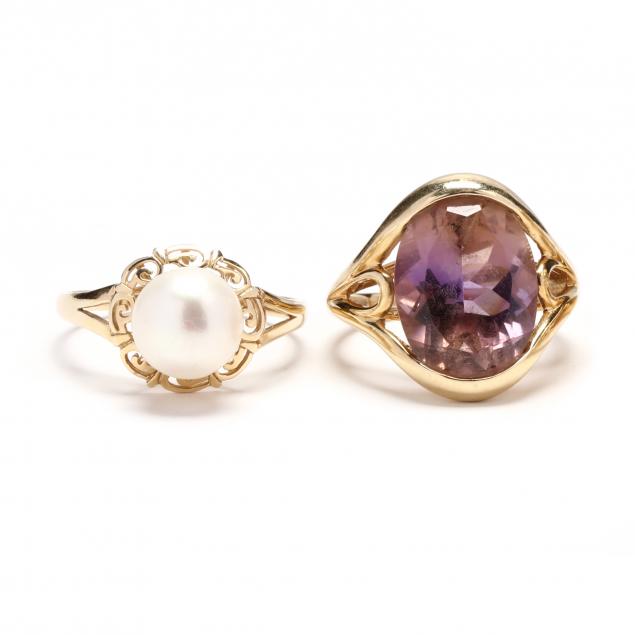 two-gold-and-gem-set-rings