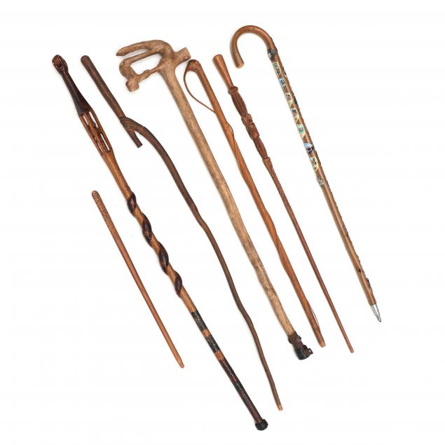 six-vintage-canes-and-a-carved-wooden-implement