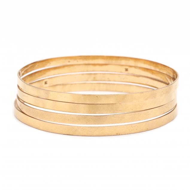set-of-four-gold-bangle-bracelets