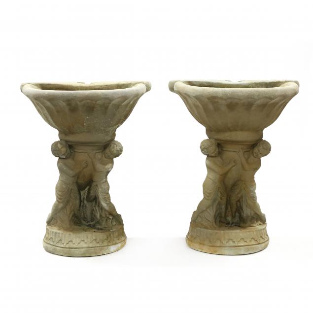 pair-of-figural-cast-stone-wall-planters
