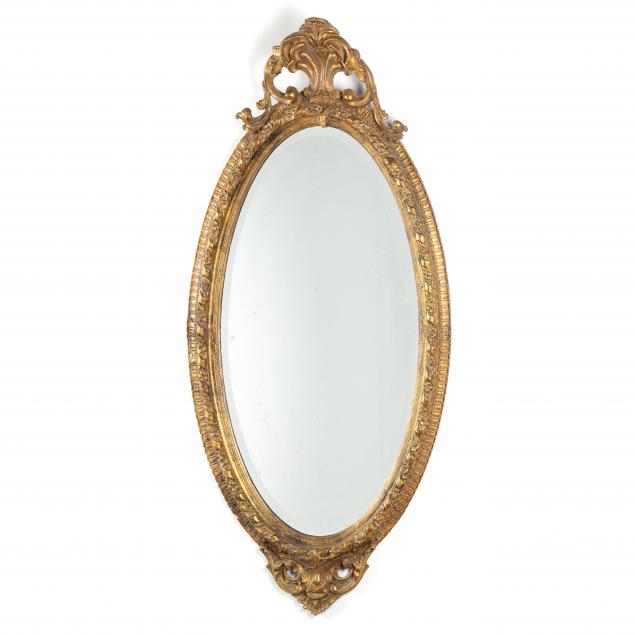classical-style-carved-and-gilt-oval-mirror