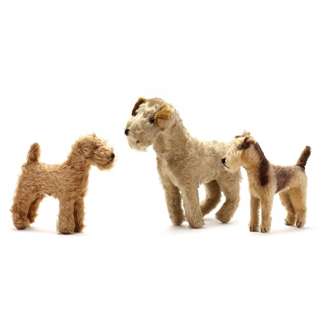 three-vintage-stuffed-toy-dogs