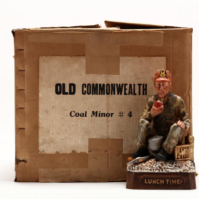 old-commonwealth-bourbon-whiskey-in-coal-miner-decanters