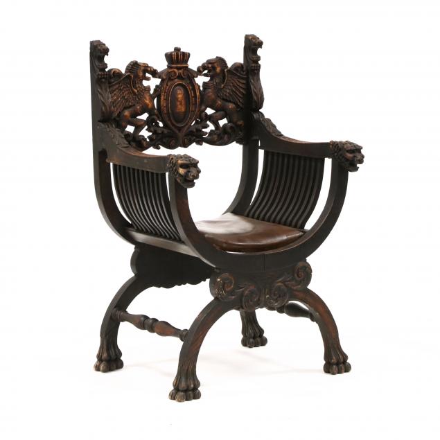 curule-form-carve-oak-armchair