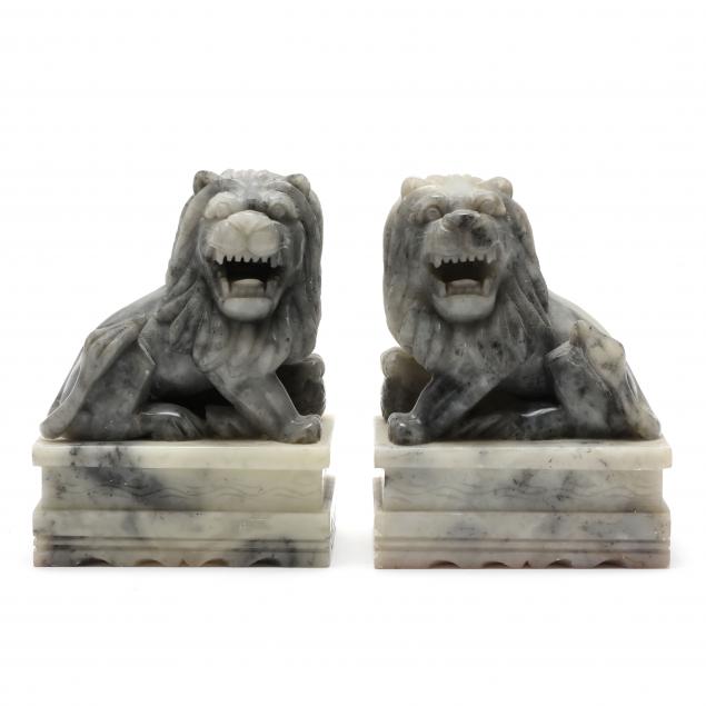 pair-of-carved-soapstone-lions-in-the-asian-style
