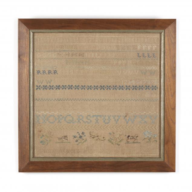 framed-needlework-sampler