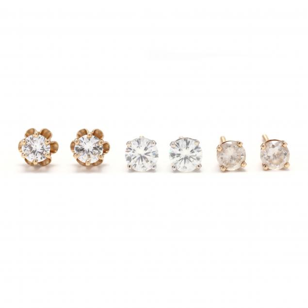 three-pairs-of-diamond-stud-earrings