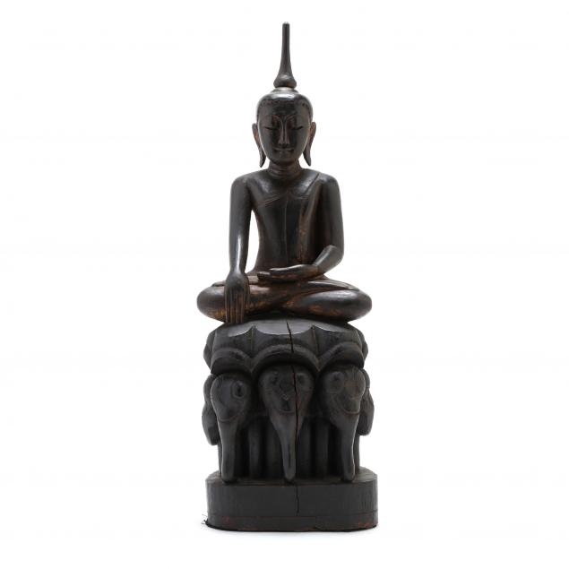 a-burmese-carved-wooden-sculpture-of-buddha-riding-elephants
