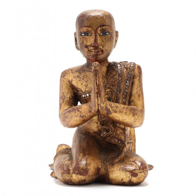 a-burmese-kneeling-gilt-wood-monk-sculpture