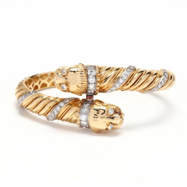 gold-and-diamond-lion-motif-bracelet-signed
