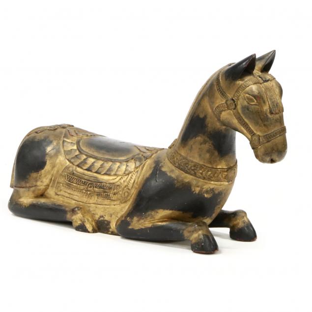 southeast-asian-carved-and-parcel-gilt-recumbent-horse