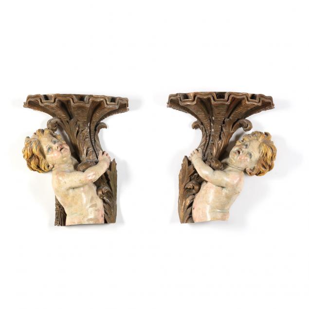pair-of-painted-and-gilt-putto-wall-ornaments