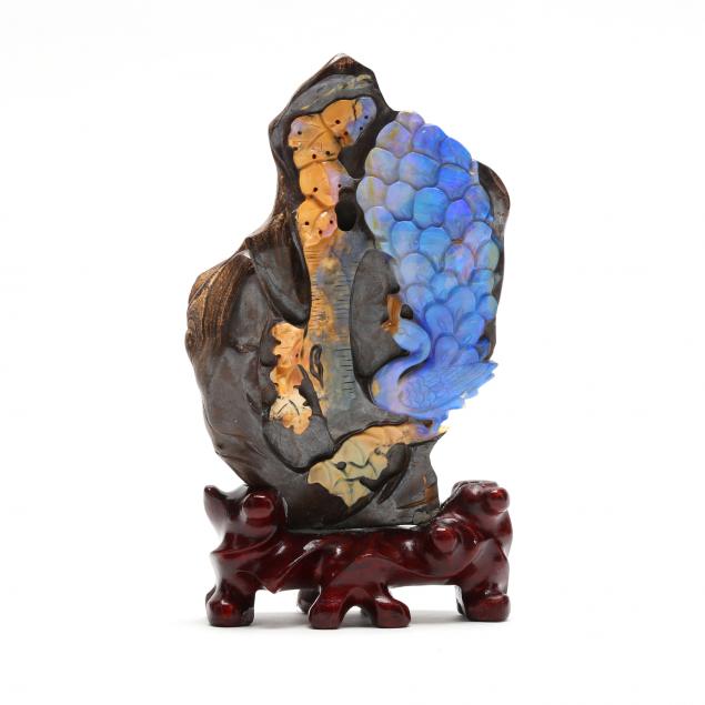 a-chinese-boulder-opal-peacock-carving