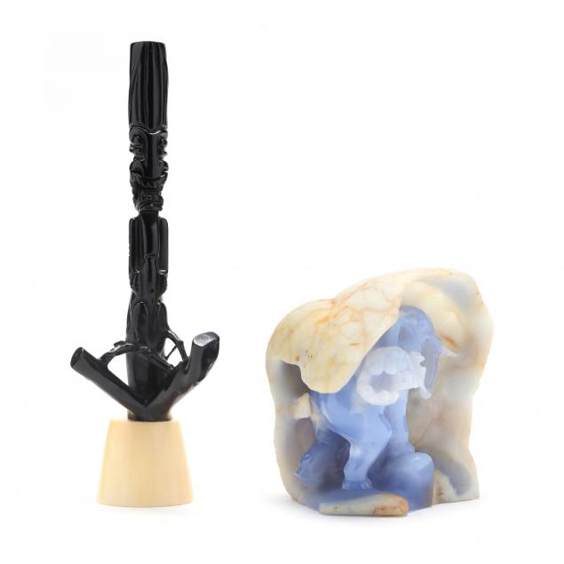 a-light-blue-agate-carving-and-black-coral-sculpture
