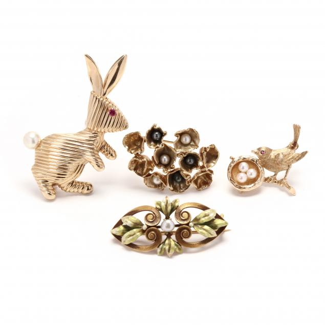 four-gold-brooches