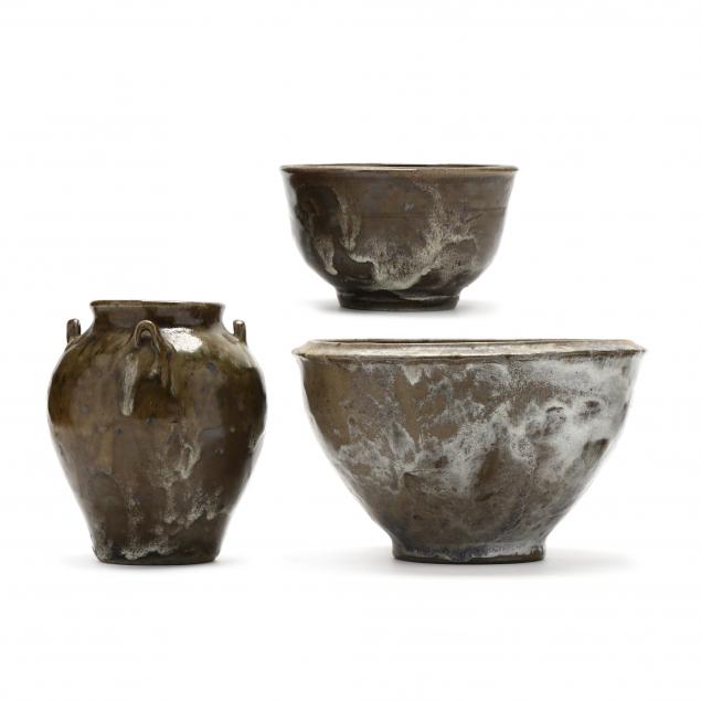 a-group-of-black-ankle-glazed-pots-jugtown-nc