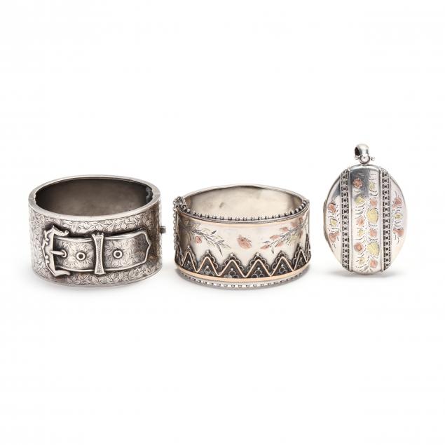 three-silver-jewelry-items