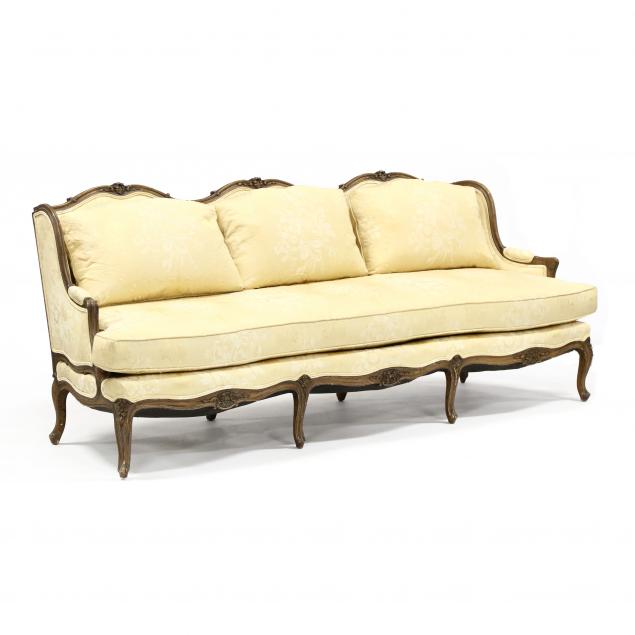 french-provincial-style-carved-and-upholstered-sofa