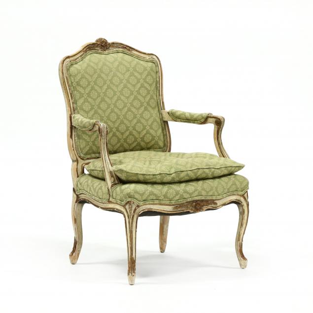 continental-carved-and-parcel-gilt-fauteuil